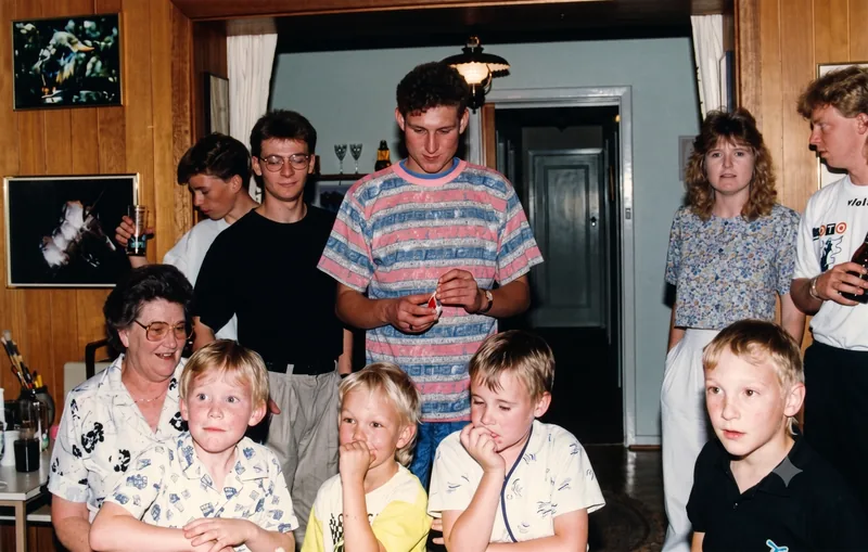Group of family and friends in a living room; older and younger generations, Pooraka, Adelaide, November 1990. Digitally restored version.